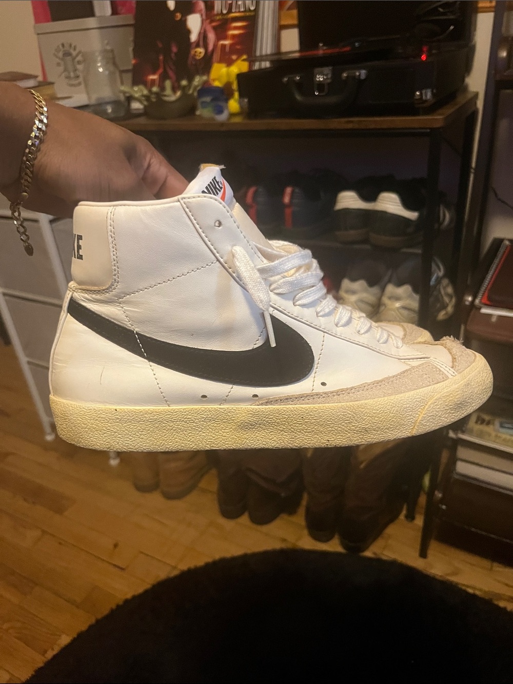 Nike White High-Top Sneakers with Black Swoosh
